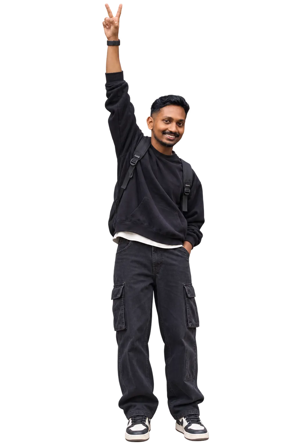 vipin, one hand up in a peace sign, holding the end of the thread